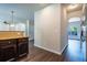 Kitchen featuring wooden floor and dark wood cabinets with granite countertops at 120 Park Village Dr, Canton, GA 30114