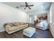 Living room with dark wood floors, a fireplace and lots of natural light at 120 Park Village Dr, Canton, GA 30114