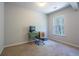 Bright office space featuring a desk with computer, chair, and natural light from the window at 120 Park Village Dr, Canton, GA 30114