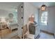 Bright bedroom view showcases a neutral palette and adjacent hall decor at 14 Lochurst Ln # 153, Roswell, GA 30076
