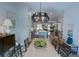 Open-concept living with modern dining area and views to the kitchen and Gathering room at 14 Lochurst Ln # 153, Roswell, GA 30076