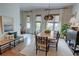 Charming dining room with natural light, stylish lighting, and designer touches at 14 Lochurst Ln # 153, Roswell, GA 30076