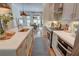 Stylish kitchen boasts light cabinetry and stainless-steel appliances at 14 Lochurst Ln # 153, Roswell, GA 30076