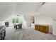 Large attic featuring vaulted ceilings and a dining area with large windows at 190 Ward Rd, Ellenwood, GA 30294