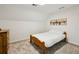Bedroom with one bed, a side table and some art on the wall at 190 Ward Rd, Ellenwood, GA 30294