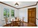 Cozy dining area with hardwood floors, natural light, and wood trim at 190 Ward Rd, Ellenwood, GA 30294