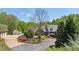 Beautiful brick home with a welcoming front porch and professionally landscaped yard at 190 Ward Rd, Ellenwood, GA 30294