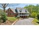 Well-maintained brick home with a charming front porch and steps leading up to it at 190 Ward Rd, Ellenwood, GA 30294