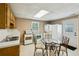 This charming kitchen includes a dining table, ample storage, and modern appliances at 190 Ward Rd, Ellenwood, GA 30294