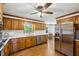 Spacious kitchen features stainless steel appliances, white counters, and hardwood flooring at 190 Ward Rd, Ellenwood, GA 30294