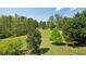 This sprawling property boasts mature trees and lush greenery, perfect for outdoor enthusiasts at 190 Ward Rd, Ellenwood, GA 30294