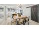 Charming dining room with a wood table, modern chairs, barn door, and bright accents at 285 Lakemoore Ne Dr # A, Atlanta, GA 30342