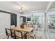 Comfortable dining room featuring a stylish wood table, chairs, and bright, open lighting at 285 Lakemoore Ne Dr # A, Atlanta, GA 30342