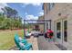 Enjoy outdoor living on this brick patio with pergola, seating, and grill at 3049 Ivy Crossing Dr, Buford, GA 30519