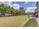 Expansive backyard offering a beautiful patio and lush green space for outdoor activities at 3049 Ivy Crossing Dr, Buford, GA 30519