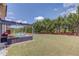 Large, well-manicured backyard, perfect for entertaining or relaxing at 3049 Ivy Crossing Dr, Buford, GA 30519
