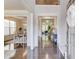 Inviting foyer with hardwood floors, open layout, and views into dining and living areas at 3049 Ivy Crossing Dr, Buford, GA 30519