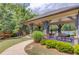 Pool pavilion with picnic tables, seating and grill, offering an ideal spot for relaxation by the pool at 3049 Ivy Crossing Dr, Buford, GA 30519