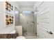 Bathroom featuring a tiled walk-in shower at 4890 Revere Way, Cumming, GA 30028