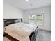 Cozy bedroom featuring a queen-sized bed and natural light at 4890 Revere Way, Cumming, GA 30028