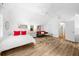 Bright bedroom featuring white paint, hardwood floors, vaulted ceilings, a bed, and recessed lighting at 230 Bristolstone Ct, Alpharetta, GA 30005