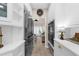 Modern kitchen with stainless steel appliances, a refrigerator, and white cabinetry at 230 Bristolstone Ct, Alpharetta, GA 30005