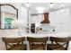 Kitchen showcasing white cabinetry, quartz countertops, marble backsplash, and pendant lighting at 230 Bristolstone Ct, Alpharetta, GA 30005