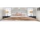 This main bedroom features a comfortable bed, side tables, and lamps at 230 Bristolstone Ct, Alpharetta, GA 30005
