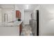 Galley kitchen featuring granite countertops, stainless steel appliances, and wood cabinets at 2700 Pine Tree Ne Rd # 1214, Atlanta, GA 30324