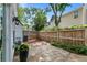 Backyard with a stone patio, wooden fence, and mature landscaping at 3303 Timbercreek Cir, Roswell, GA 30076
