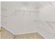 Spacious walk-in closet featuring carpeted floors and multiple wire shelves at 3303 Timbercreek Cir, Roswell, GA 30076