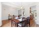 View of dining area showcasing pendant light and partial view of kitchen at 3303 Timbercreek Cir, Roswell, GA 30076