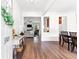 Warm and welcoming foyer featuring wood floors and an open view of the living and dining areas at 3303 Timbercreek Cir, Roswell, GA 30076