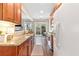 Efficient kitchen layout with granite counters, stainless steel appliances, and outdoor patio access at 3303 Timbercreek Cir, Roswell, GA 30076