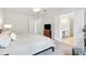 Spacious main bedroom featuring access to the main bath, and a window with natural light at 3303 Timbercreek Cir, Roswell, GA 30076