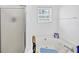 Bathroom featuring tub with jacuzzi jets and separate shower with glass door at 745 Beaver Pond Trl, Fairburn, GA 30213