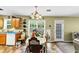 View of the dining area featuring a table and chairs at 745 Beaver Pond Trl, Fairburn, GA 30213