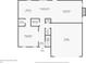 First floor plan with kitchen, living room, dining room, and garage at 745 Beaver Pond Trl, Fairburn, GA 30213