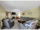 Comfortable living room with a fireplace and cozy seating at 745 Beaver Pond Trl, Fairburn, GA 30213
