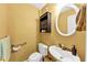 Powder room with vanity and fixtures at 745 Beaver Pond Trl, Fairburn, GA 30213