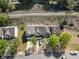 Wide aerial shot of cozy townhomes with ample parking and verdant foliage at 2293 Baker Station Dr, Acworth, GA 30101