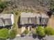 Overhead view of townhomes with gray shingles, two-car garages, and manicured lawns at 2293 Baker Station Dr, Acworth, GA 30101