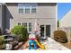 Backyard patio includes patio furniture, grill, and play set at 2293 Baker Station Dr, Acworth, GA 30101