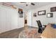 Bedroom featuring a closet, desk, and decorative rug at 2293 Baker Station Dr, Acworth, GA 30101