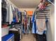 Walk-in closet with shelving and hanging storage at 2293 Baker Station Dr, Acworth, GA 30101