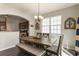 Dining room featuring a rustic table and chair set with lots of natural light at 2293 Baker Station Dr, Acworth, GA 30101