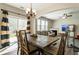 Dining room featuring a rustic dining set with easy access to the living room at 2293 Baker Station Dr, Acworth, GA 30101