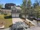 Charming townhome with attached two-car garage and well-manicured lawn in a desirable neighborhood at 2293 Baker Station Dr, Acworth, GA 30101