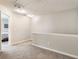 Bright hallway features neutral walls, plush carpeting, and access to other areas of the home at 2293 Baker Station Dr, Acworth, GA 30101