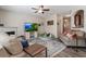 Inviting living room featuring a fireplace, modern entertainment center, and comfortable seating arrangement at 2293 Baker Station Dr, Acworth, GA 30101